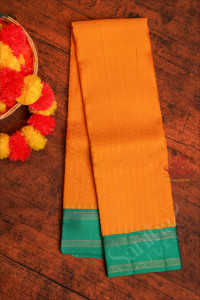 yellow-colour-body-with-zari-butta-with-contrast-blouse-border