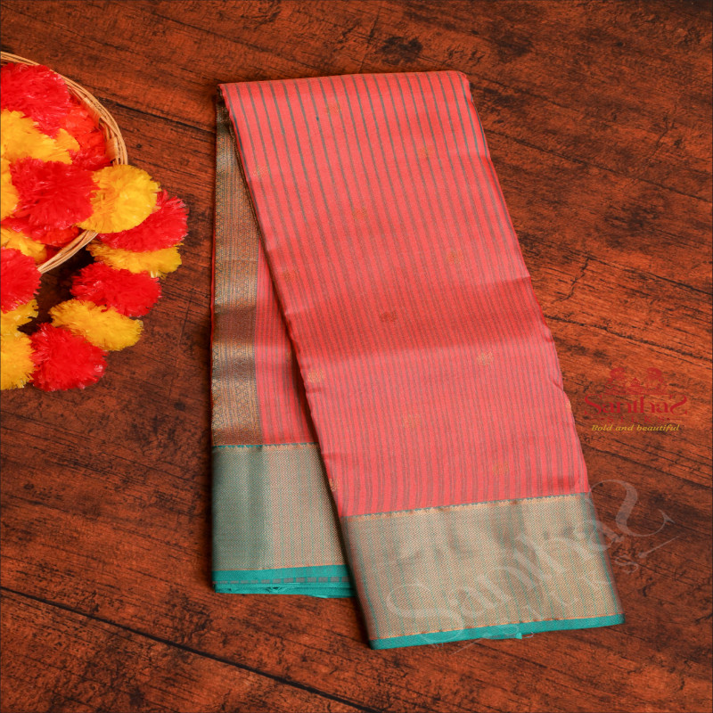 GEORGIA PEACH COLOUR BODY WITH ZARI ANNAM BUTTA WITH CONTRAST BLOUSE & BORDER