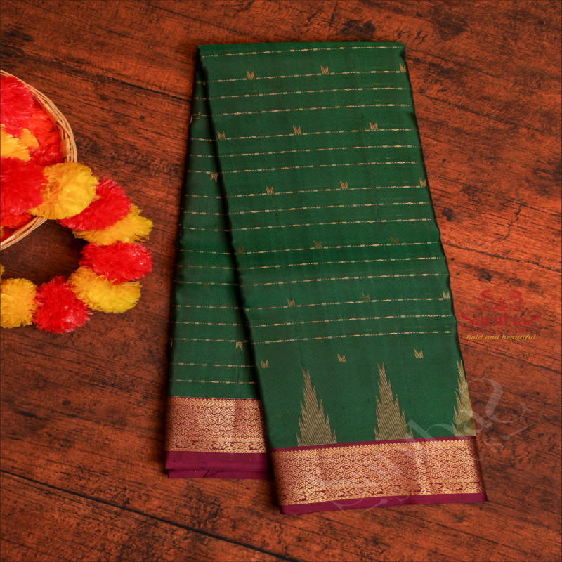 DARK GREEN COLOUR BODY WITH GOLDEN ZARI TEMPLE BUTTA & LINES AND CONTRAST PALLU & BLOUSE