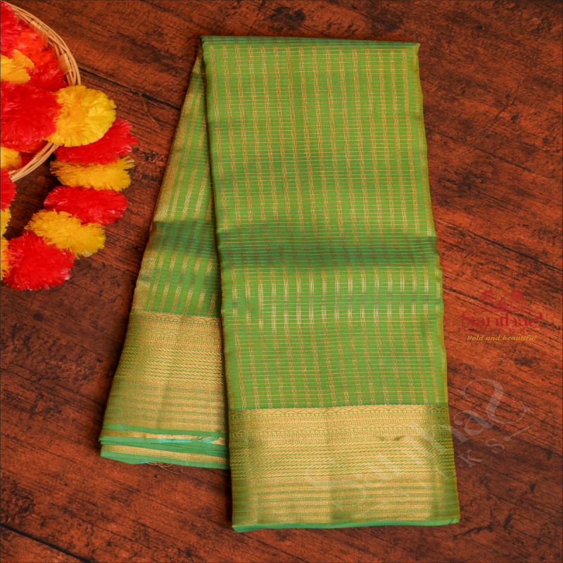 SPRING GREEN COLOUR BODY WITH GOLDEN ZARI SMALL CHECKS AND SELF COLOUR PALLU & BLOUSE