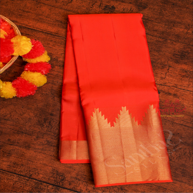 ORANGE COLOUR BODY WITH LONG BORDER IN TEMPLE DESIGN AND SELF PALLU & CONTRAST BLOUSE