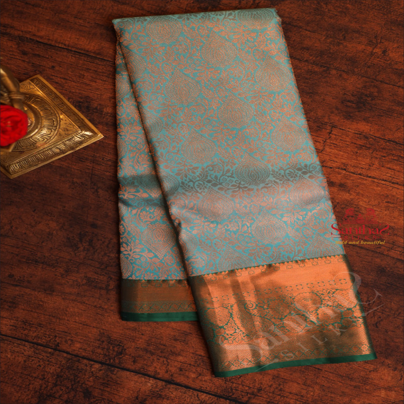 BLUE COLOUR BODY WITH JACQUARD FLORAL EMBOSED WITH CONTRAST BLOUSE & BORDER