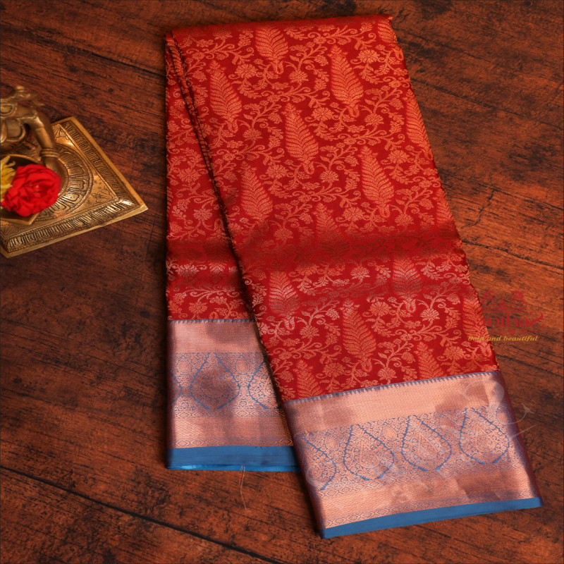 RED COLOUR BODY WITH JACQUARD FLORAL EMBOSED WITH CONTRAST BLOUSE & BORDER