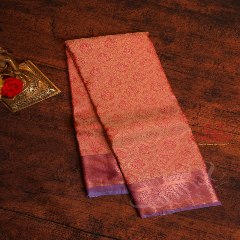 PEACH COLOUR BODY WITH JACQUARD FLORAL EMBOSED WITH CONTRAST LAVENDAR BLOUSE & BORDER