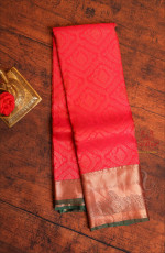 BRIGHT PINK COLOUR BODY WITH JACQUARD FLORAL EMBOSED WITH CONTRAST BLOUSE & PALLU