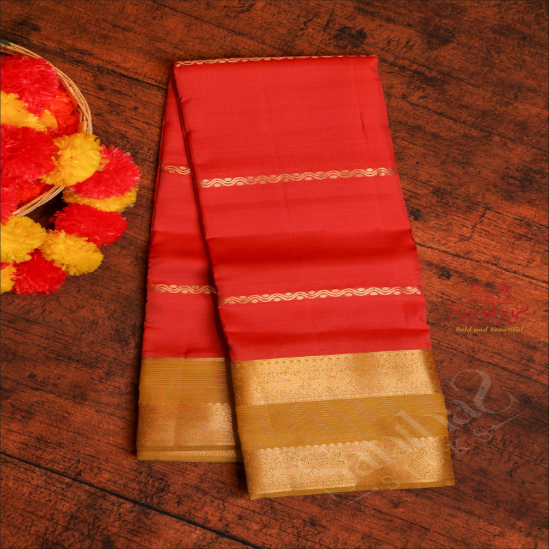 BRICK RED COLOUR BODY WITH VELTHARI ZARI BUTTA WITH CONTRAST BLOUSE & BORDER