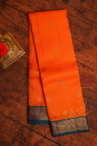 orange-colour-body-with-golden-zari-buttas-and-contrast-peacock-blur-pallu-blouse