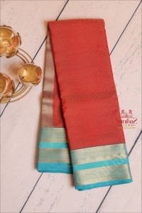 maroon-colour-body-with-golden-zari-strips-and-contrast-blue-pallu-blouse