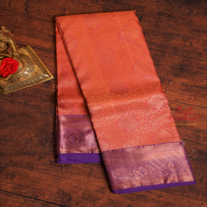 PEACH BUD COLOUR BODY WITH JACQUARD FLORAL EMBOSED WITH CONTRAST BLOUSE & PALLU