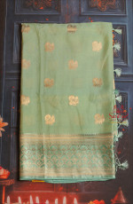 PARRIS GREEN COLOUR SATIN BANARAS SAREE WITH ZARI ANNAM BUTTA AND SELF BLOUSE