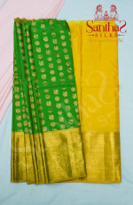 PARROT GREEN BODY IN ANNAM CHAKKRAM BUTTA WITH CONTRAST BLOUSE & BORDER
