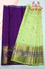 PISTA GREEN IN BODY ZARI BUTTA WITH CONTRAST BLOUSE