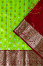 MEENAKSHI GREEN BODY IN ZARI BUTTA WITH CONTRAST BLOUSE & BORDER