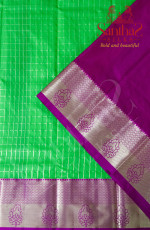 GREEN COLOUR BODY IN CHECKED PATTERN WITH CONTRAST BLOUSE & BORDER