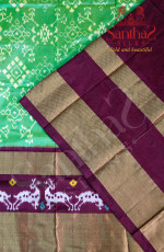 GREEN COLOUR BODY IN IKKAT PRINT WITH CONTRAST BLOUSE & BORDER