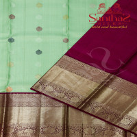 LIGHT GREEN BODY COLOUR IN ZARI BUTTA WITH CONTRAST BLOUSE & BORDER