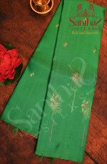 BORDERLESS PARROT GREEN COLOUR BODY WITH SILVER ZARI & PINK THREAD MOTIFS AND CONTRAST BLOUSE