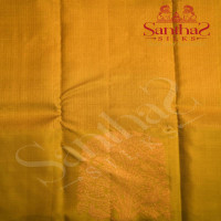 PEAR GREEN COLOUR BODY WITH COPPER ZARI IN CHECKED PATERNS & TREE MOTIFS AND CONTRAST BLOSE