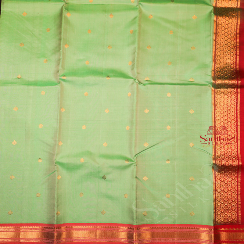 PARIS GREEN COLOUR BODY WITH GOLDEN ZARI BUTTA WITH CONTRAST BLOUSE & BORDER
