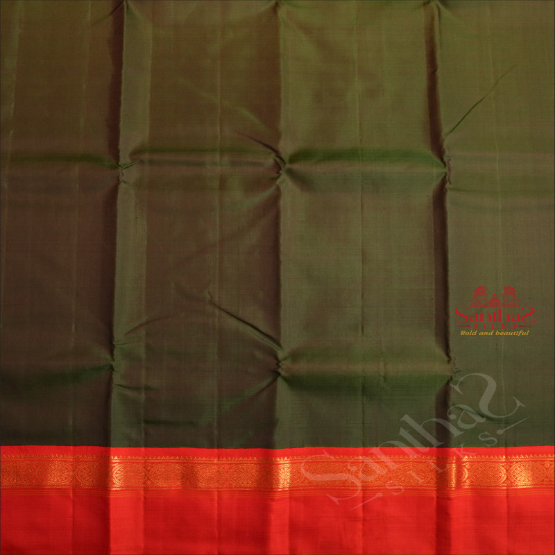 DARK GREEN COLOUR PLAIN BODY WITH CONTRAST BLOUSE & BORDER