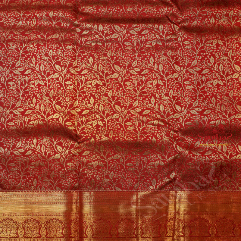 MAROON COLOUR BODY WITH GOLDEN JACQUARD FLORAL EMBOSED WITH SELF BLOUSE & BORDER