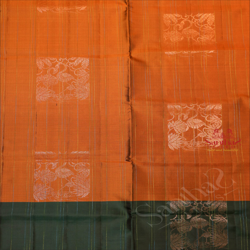 MUSTARD COLOUR BODY WITH COPPER ZARI FLORAL BUTTA & CRANCE MOTIFS WITH CONTRAST BLOUSE & BORDER